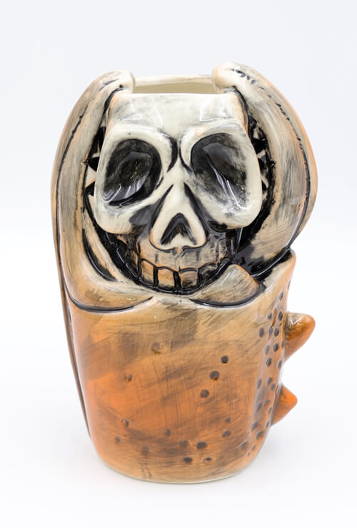 Squashed skull tiki mug