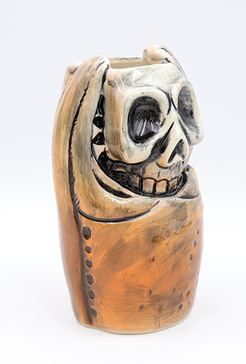 Squashed skull tiki mug