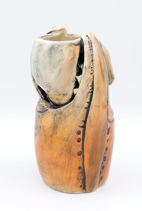 Squashed skull tiki mug