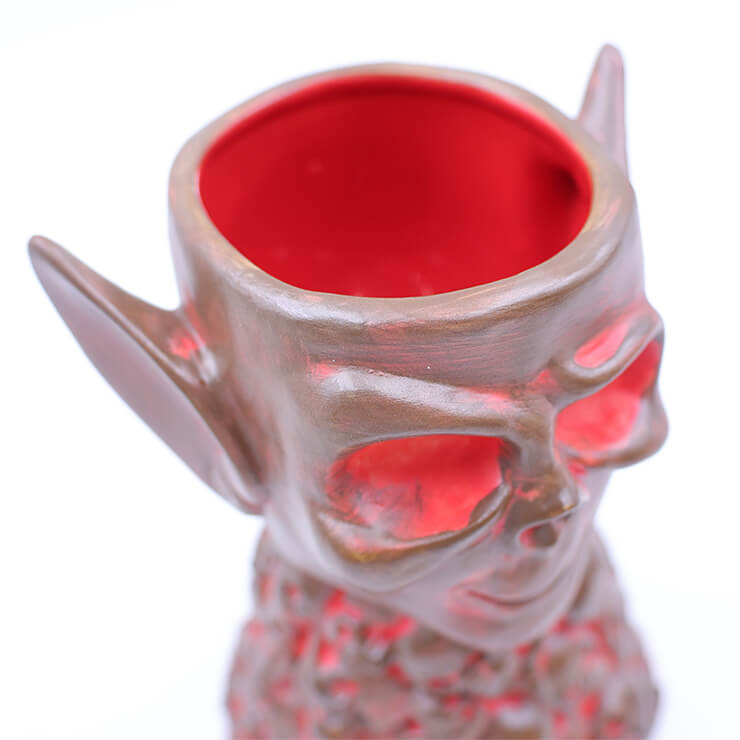 skull piles tiki mug - red & brown