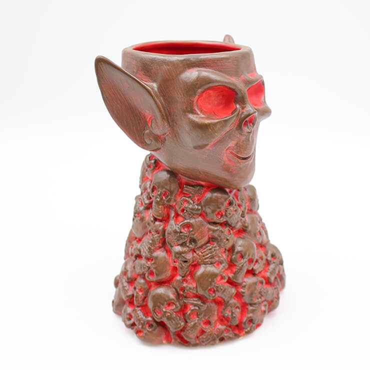 skull piles tiki mug - red & brown